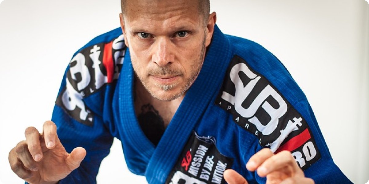 A Kung Fu practitioner displaying striking techniques in a demonstration.